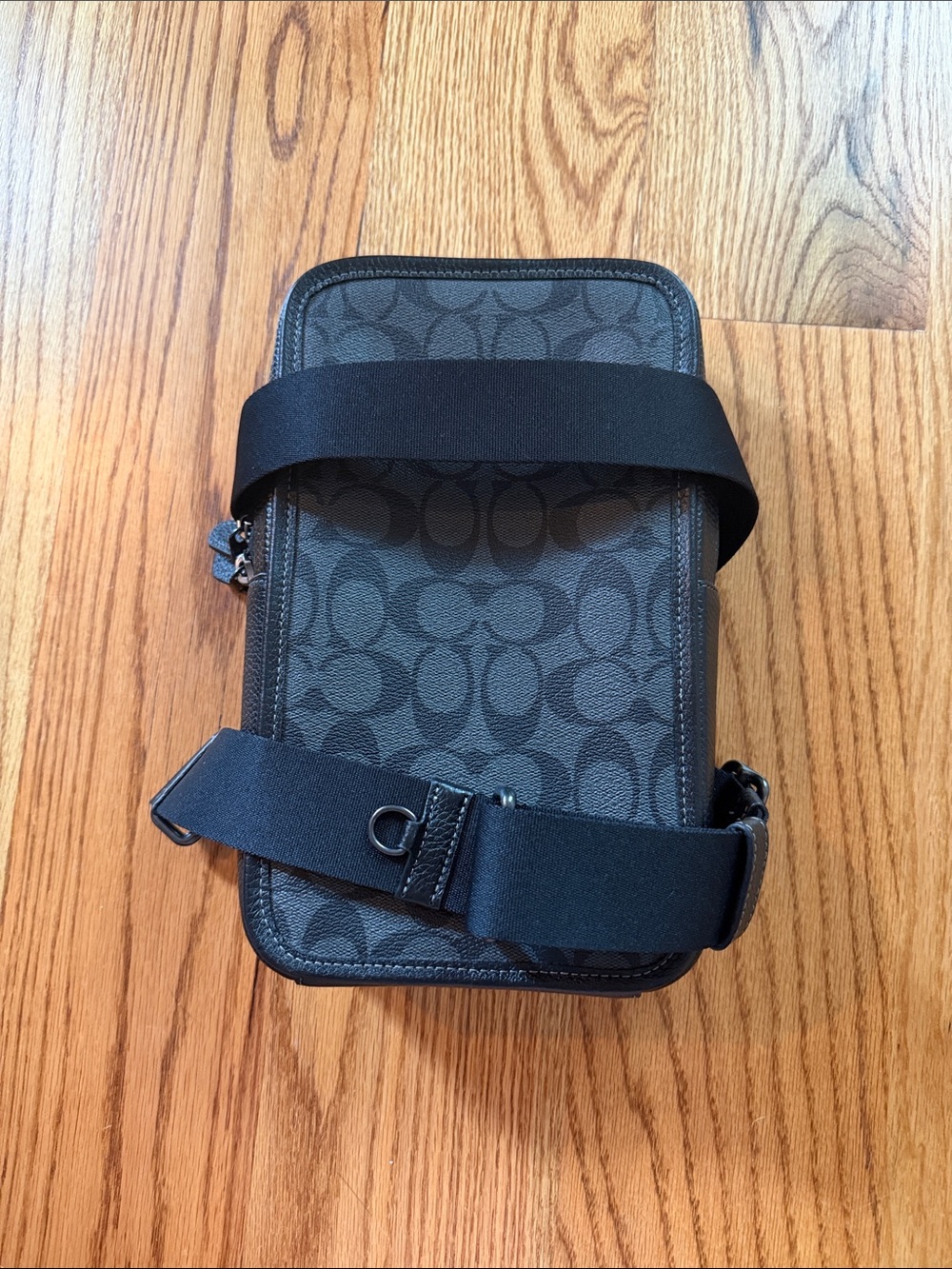 Coach Men’s Signature Canvas Sling Bag in Charcoal and Black
